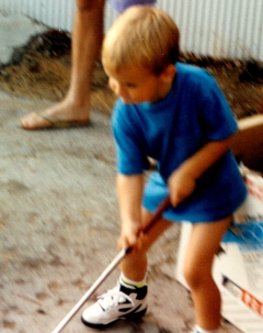 Nathan age 3 with a golf club in his hand